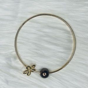 Gold bangle Bracelet with brown pearl and flower charm size 9
